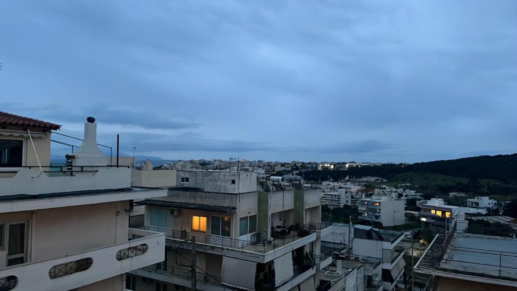 Nespecifikovaný výhled na destinaci Rafina nebo výhled na město při pohledu z apartmánu
