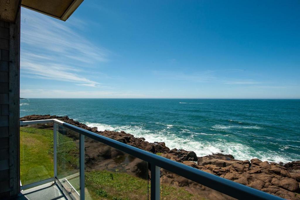 a view of the ocean from a balcony at Whale Crossing in Depoe Bay
