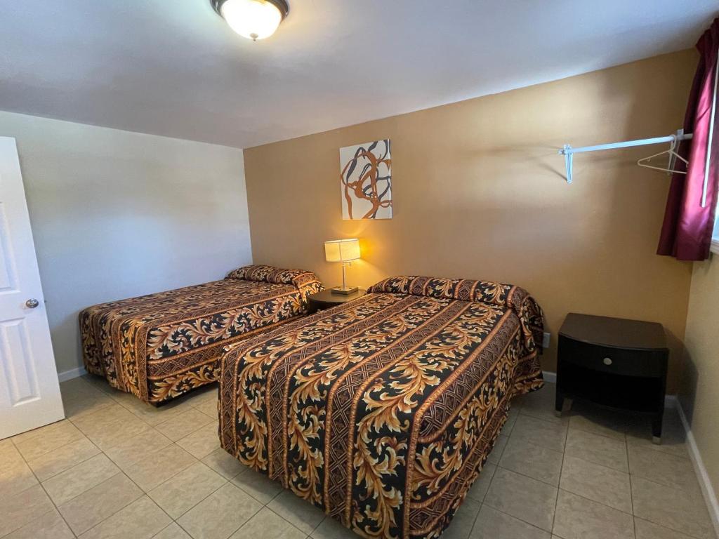 Postel nebo postele na pokoji v ubytování Anchor Motel