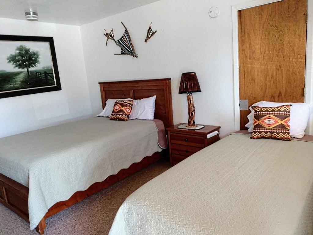 Postel nebo postele na pokoji v ubytování Mokee Motel