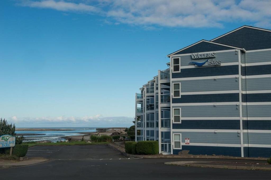 a building with a westeros sign on the side of it at Waters Edge 308 in Lincoln City