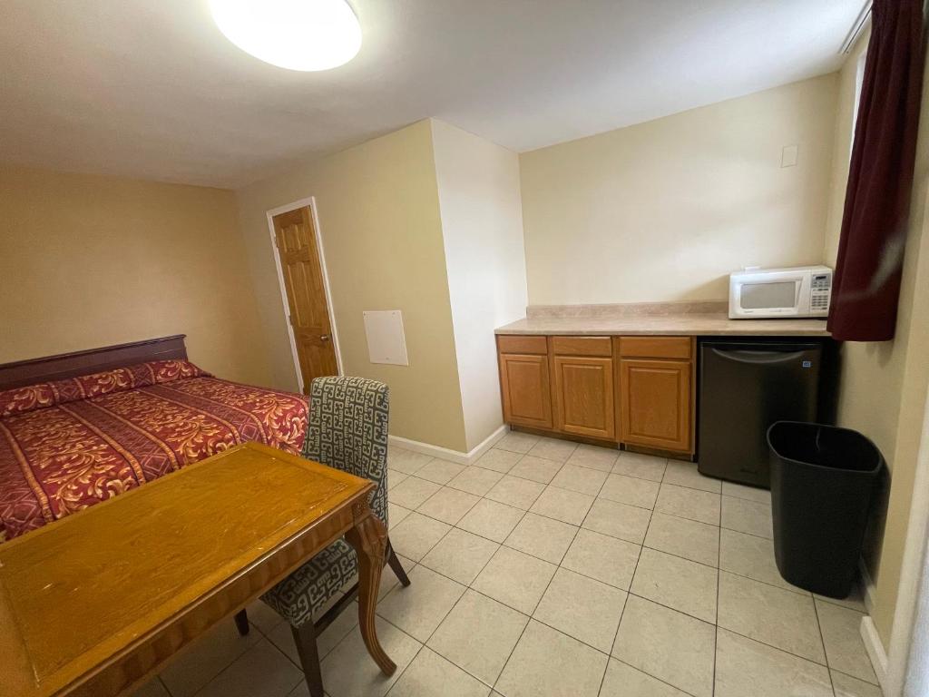 Kuchyň nebo kuchyňský kout v ubytování Anchor Motel