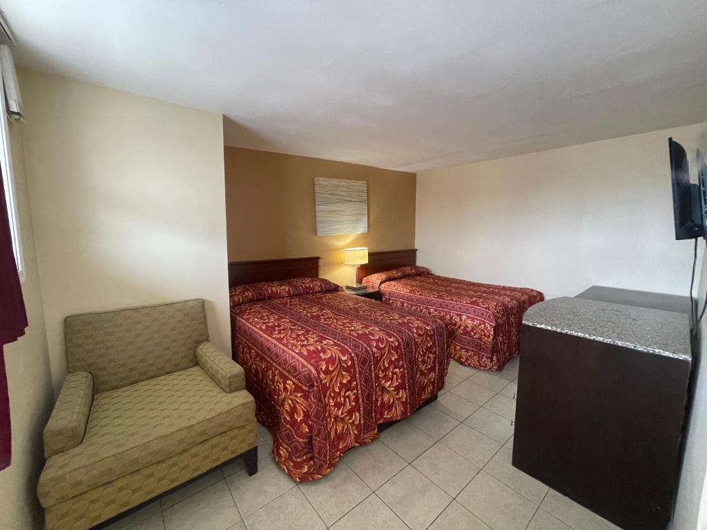 Postel nebo postele na pokoji v ubytování Anchor Motel