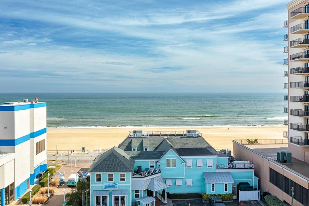 a view of the beach from a building at The Ocean Key Virginia Beach Resort in Virginia Beach