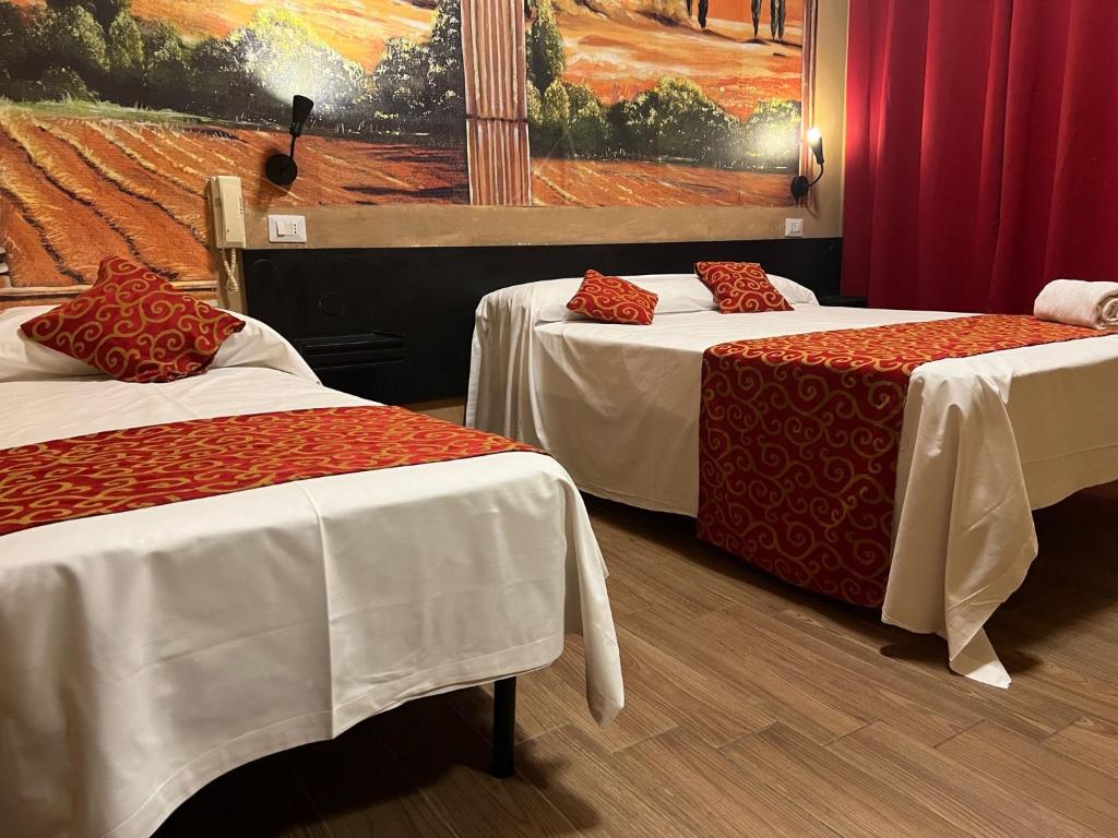 Postel nebo postele na pokoji v ubytování Albergo Corvetto Corso Lodi