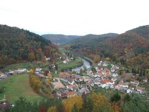 an aerial view of a small town in the mountains at Haus Pfaffenfels in Schönau