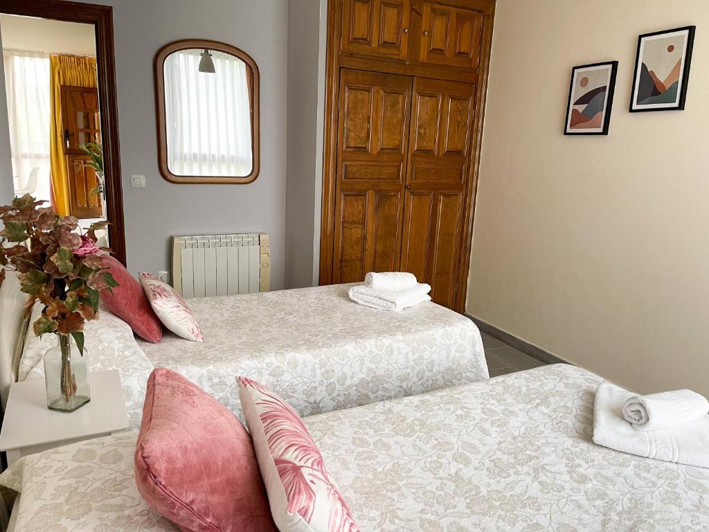 Postel nebo postele na pokoji v ubytování El Horriu
