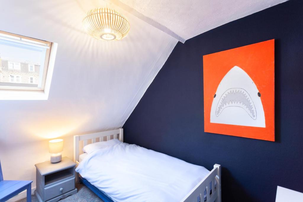 Postel nebo postele na pokoji v ubytování Ocean Backpackers self-catering hostel