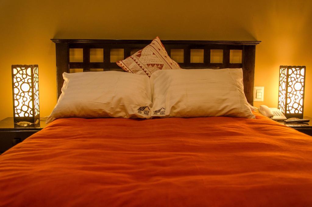 Letto o letti in una camera di Cusco Bed and Breakfast