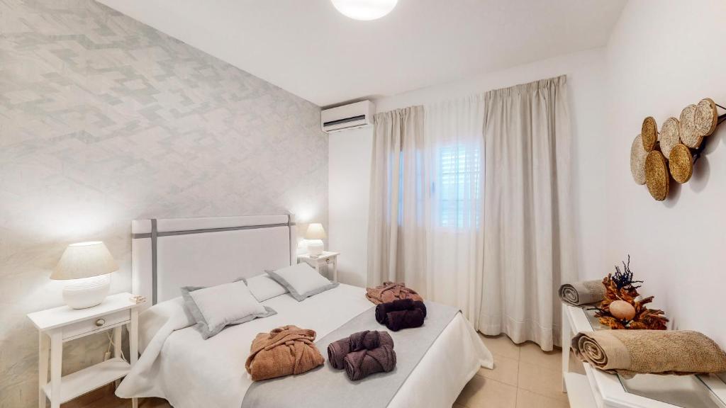 Postel nebo postele na pokoji v ubytování VILLA ANIL Lanzarote