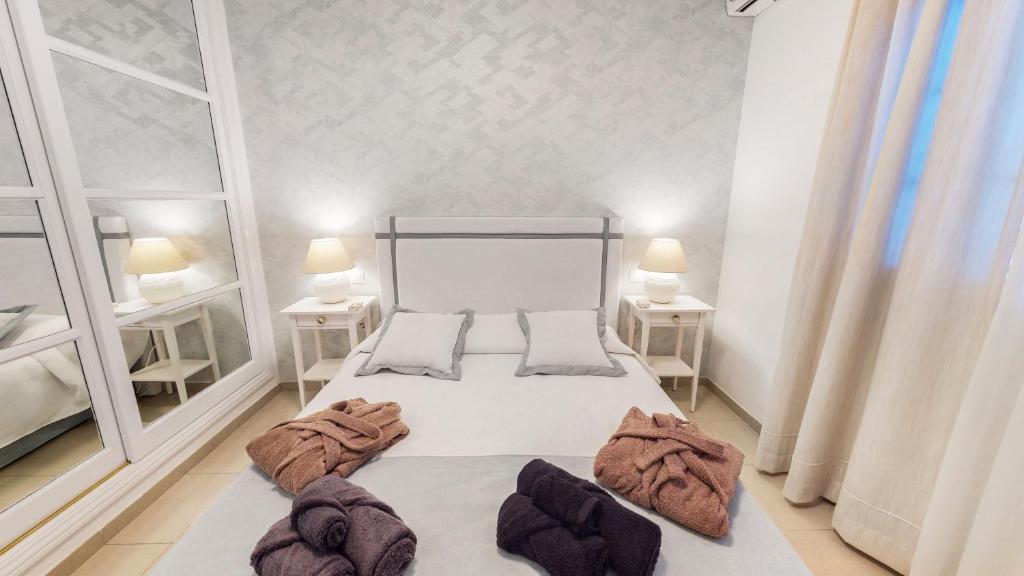 Postel nebo postele na pokoji v ubytování VILLA ANIL Lanzarote