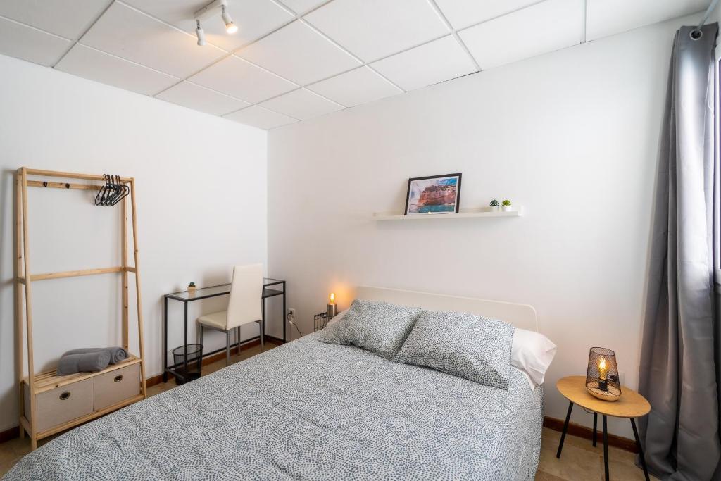 Postel nebo postele na pokoji v ubytování Un Lugar House Canteras - Coliving