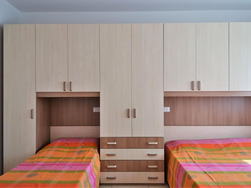 Posteľ alebo postele v izbe v ubytovaní Lake Como Apartment in Dervio