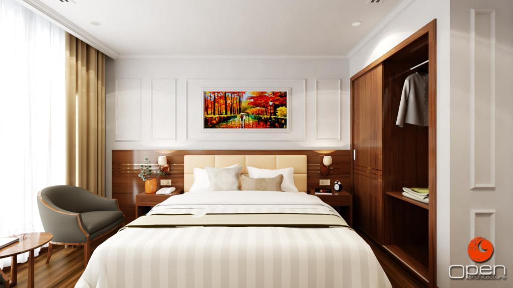 Postel nebo postele na pokoji v ubytování Hillary Hanoi Hotel