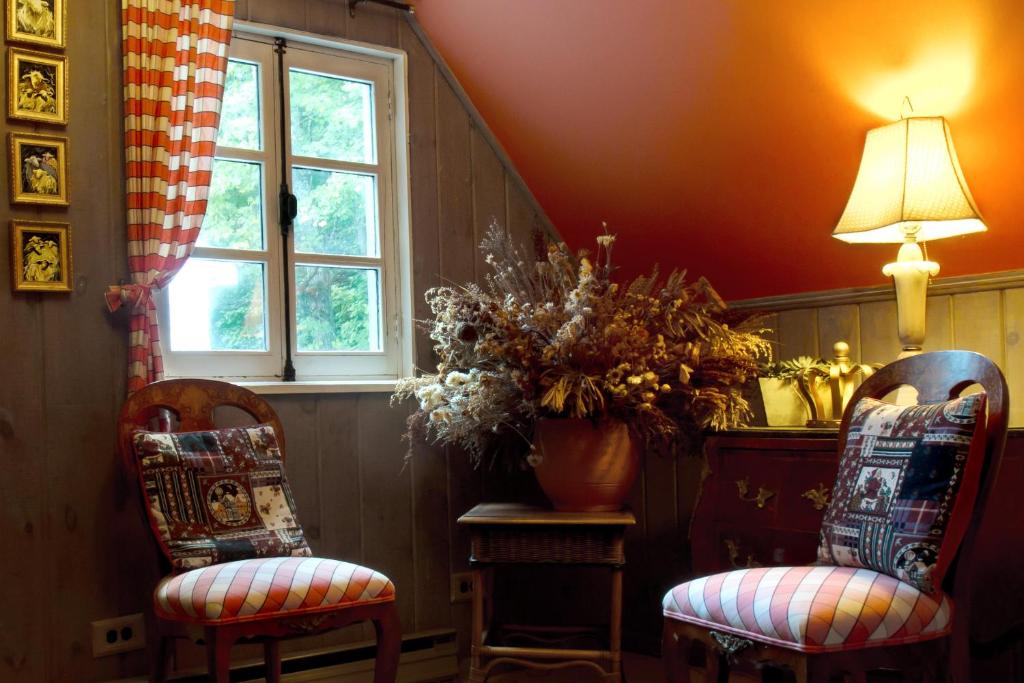 Posezení v ubytování Le Petit Clocher Gite Touristique B & B