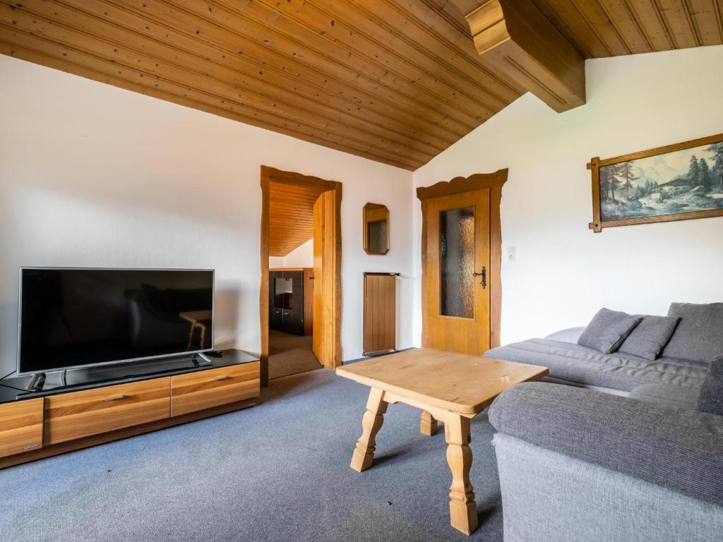 Televízia a/alebo spoločenská miestnosť v ubytovaní Weinberghof I