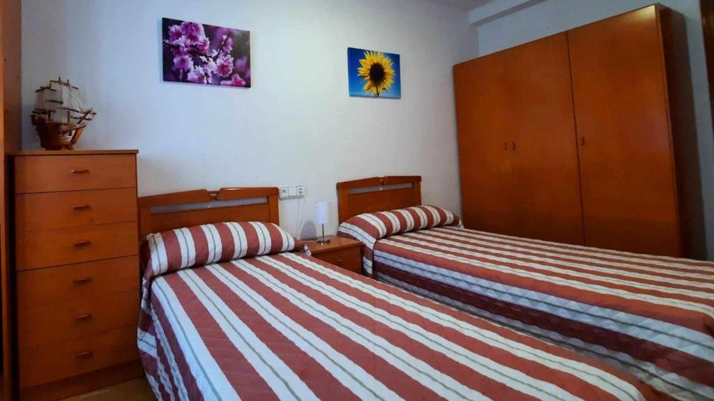 Postel nebo postele na pokoji v ubytování Riaño en las Montañas de Carmen