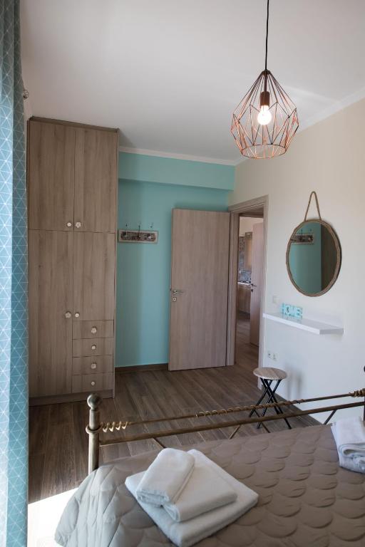Кровать или кровати в номере Casa De Blue