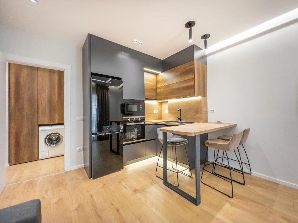 Kjøkken eller kjøkkenkrok på PIN Apartments