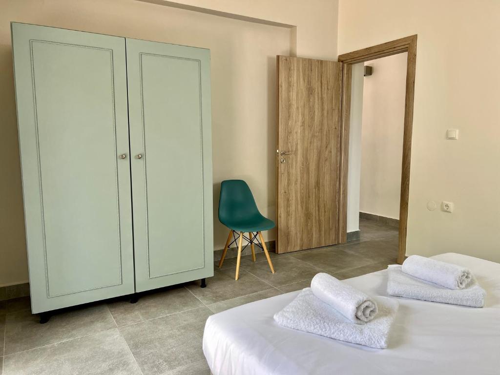Postel nebo postele na pokoji v ubytování PETRA RESIDENCES IN LINDOS