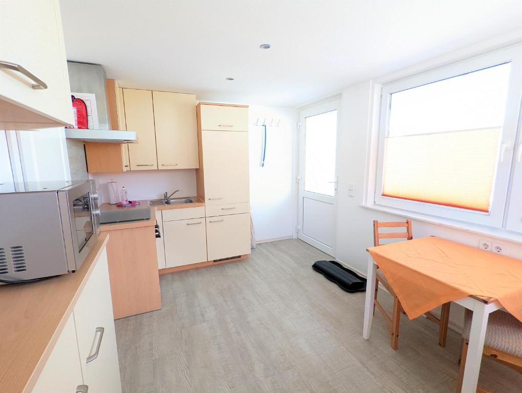 Kuchyň nebo kuchyňský kout v ubytování Ferienhaus Sellin