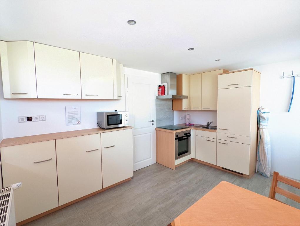 Kuchyň nebo kuchyňský kout v ubytování Ferienhaus Sellin