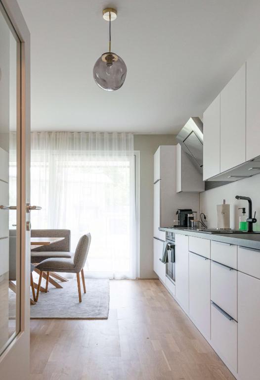 A kitchen or kitchenette at Apartments Traunkai Bad Ischl