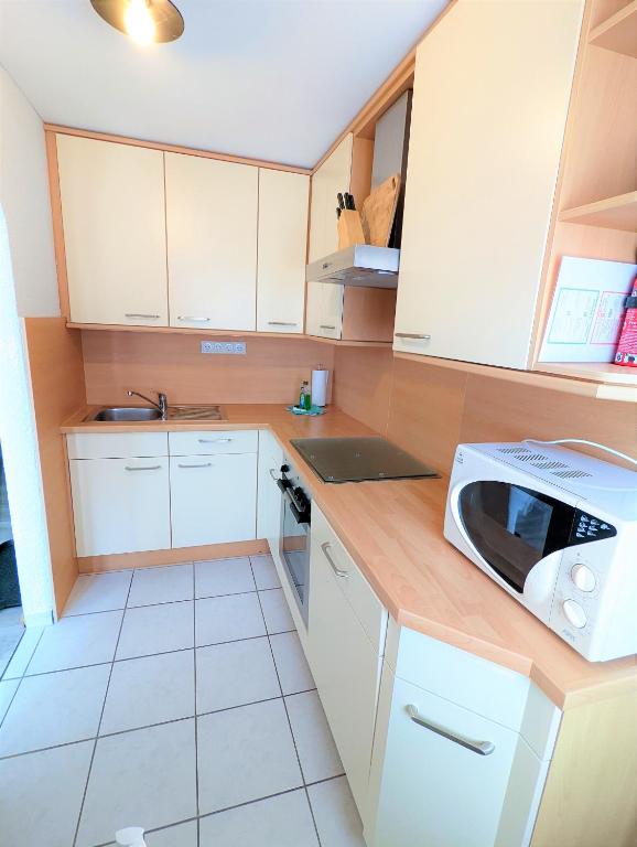 Kuchyň nebo kuchyňský kout v ubytování Ferienhaus Sellin