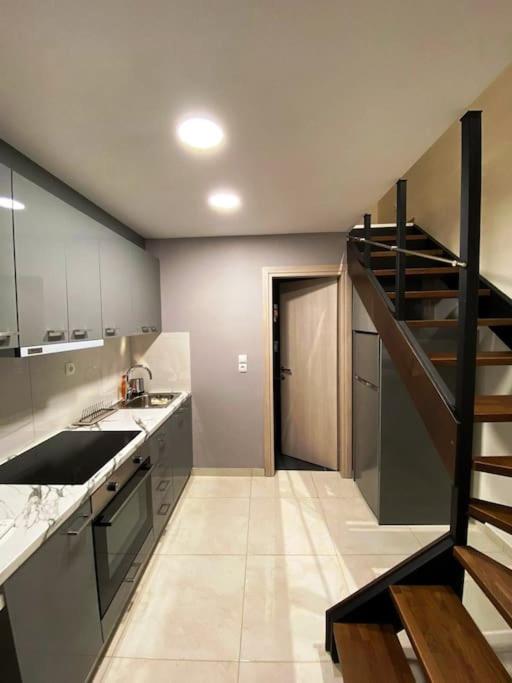 Kuchyňa alebo kuchynka v ubytovaní Luxury Loft Kalu Tsesme B