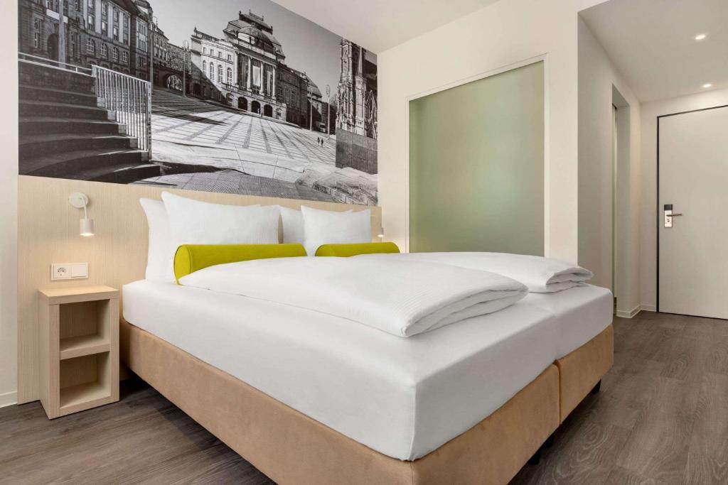 Postel nebo postele na pokoji v ubytování Super 8 by Wyndham Chemnitz