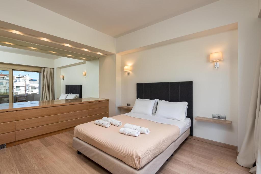 Postel nebo postele na pokoji v ubytování Vasiliki Villa