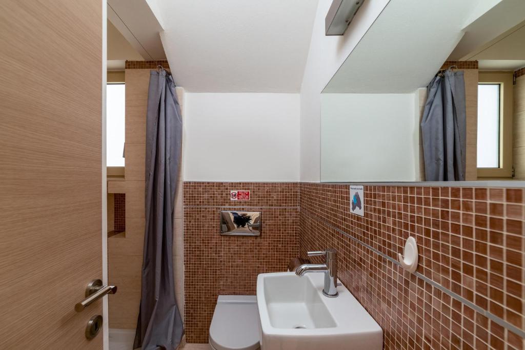 Koupelna v ubytování Vasiliki Villa