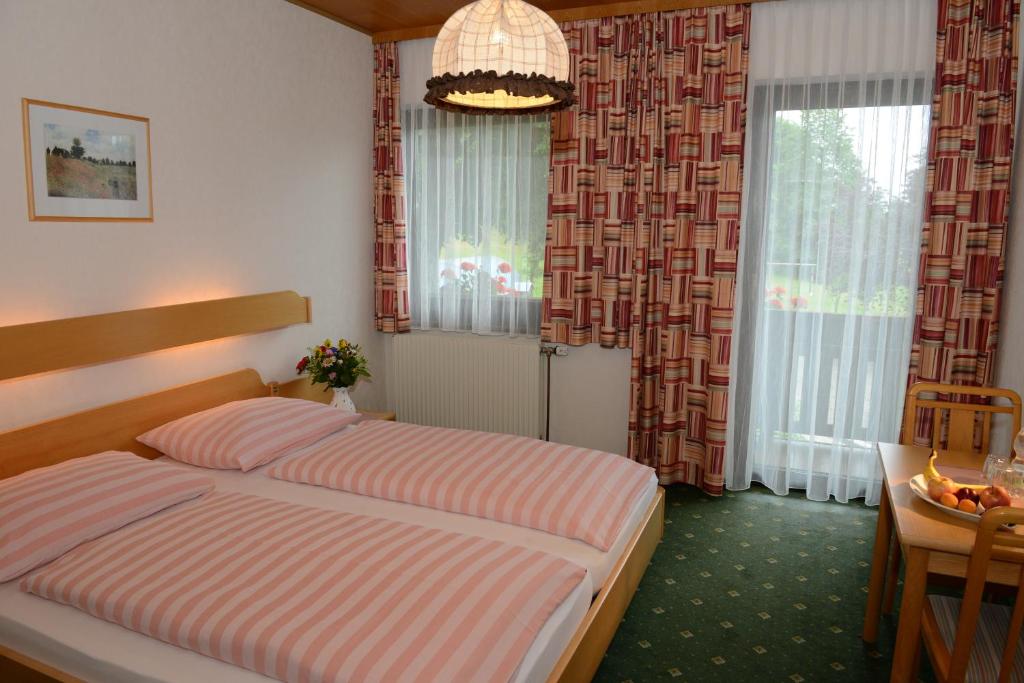 Postel nebo postele na pokoji v ubytování Frühstückspension Binder