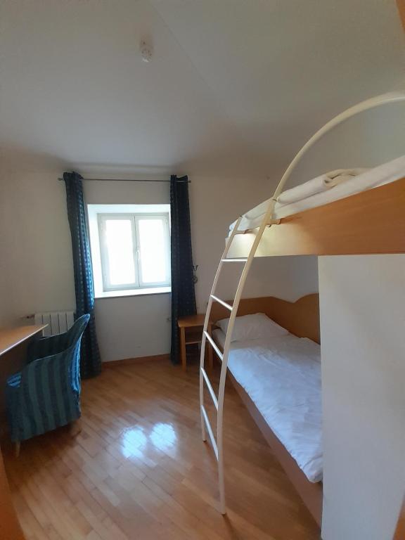 Postel nebo postele na pokoji v ubytování Aparthotel Plat