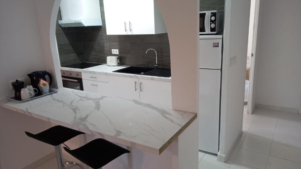 Kuchyňa alebo kuchynka v ubytovaní Fantástico Apartamento a 50m de playa Colon y Paseo