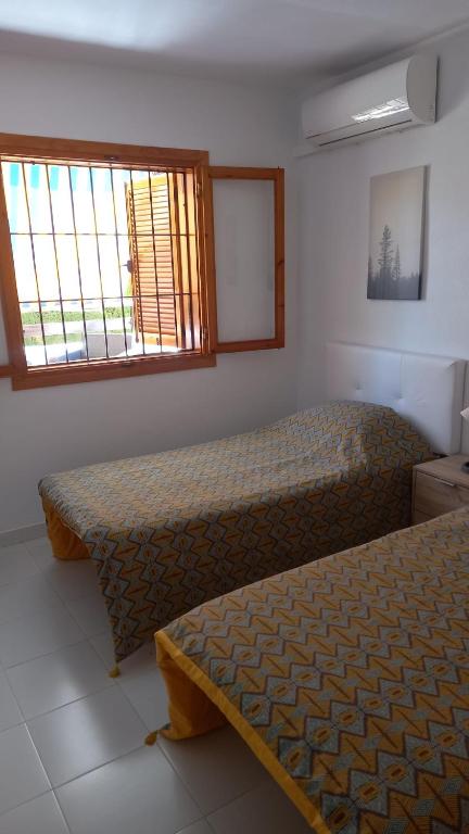 Posteľ alebo postele v izbe v ubytovaní Fantástico Apartamento a 50m de playa Colon y Paseo