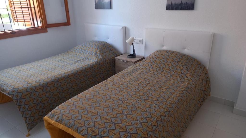 Posteľ alebo postele v izbe v ubytovaní Fantástico Apartamento a 50m de playa Colon y Paseo