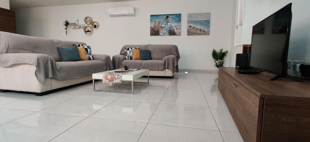 Area soggiorno di Lorenza Letting Maisonette