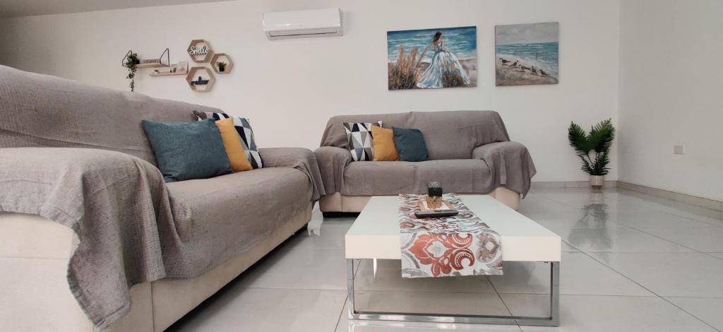 Area soggiorno di Lorenza Letting Maisonette