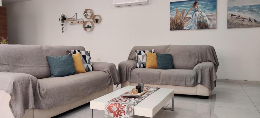Area soggiorno di Lorenza Letting Maisonette