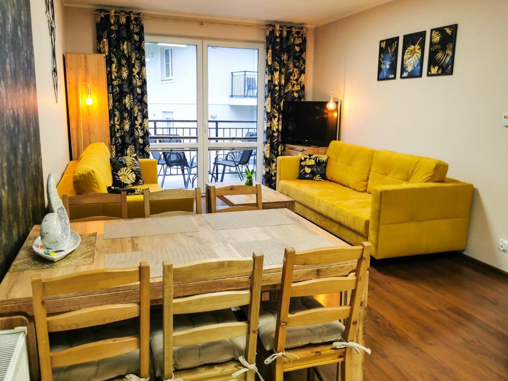 Posedenie v ubytovaní Markowe Apartamenty Złoty Park