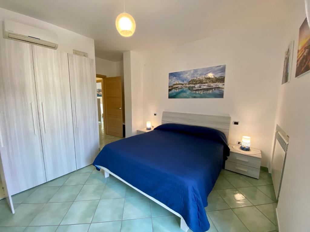 Łóżko lub łóżka w pokoju w obiekcie Ganimede Apartament