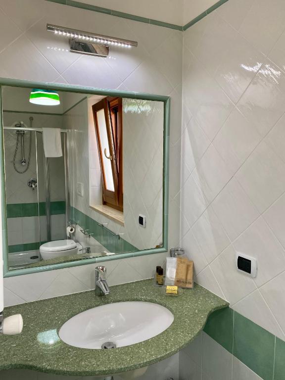 Łazienka w obiekcie Ganimede Apartament