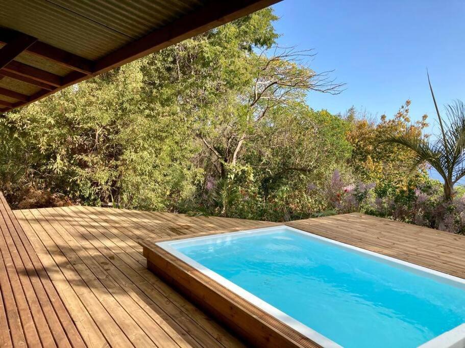 Bazén v ubytování Cottage chaleureux avec vue mer et piscine nebo v jeho okolí