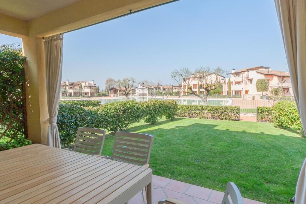 A garden outside Lugana Resort & Sporting Club