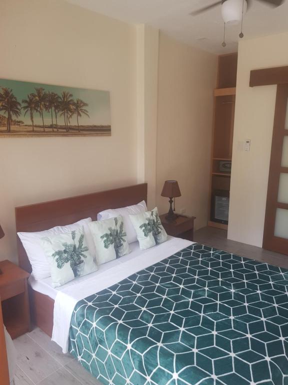 Postel nebo postele na pokoji v ubytování Hayahay Resort