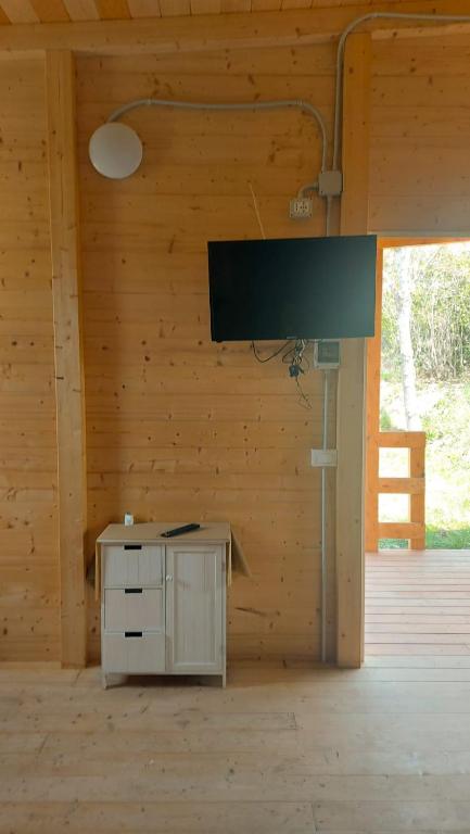 TV a/nebo společenská místnost v ubytování Camping Torre Mucchia