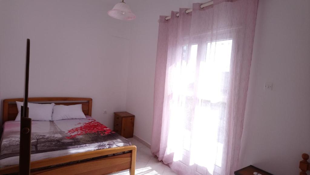 Posteľ alebo postele v izbe v ubytovaní Vacation house in Stroggili