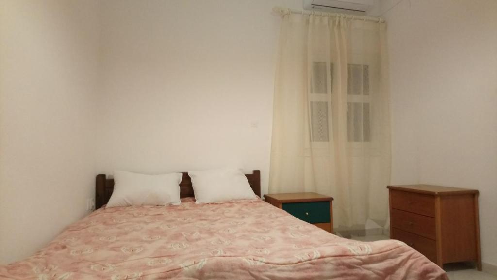 Posteľ alebo postele v izbe v ubytovaní Vacation house in Stroggili