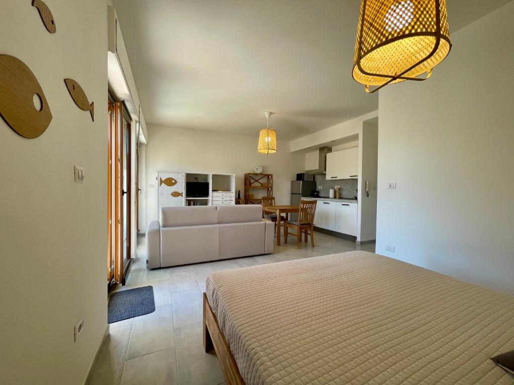 Posteľ alebo postele v izbe v ubytovaní SeaSun Guest House Alghero